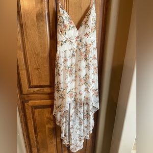 Gorgeous sun dress never worn. Size L backless